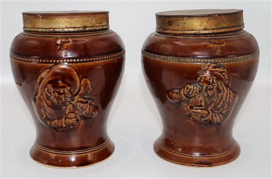 Pair of Buchan Portobello shop display relief pottery jars (tobacco and snuff) with metal covers